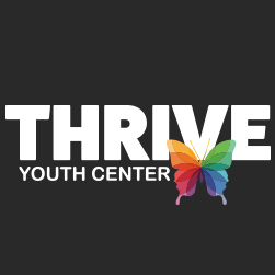 Thrive Youth Center logo with white text and a colorful butterfly graphic.